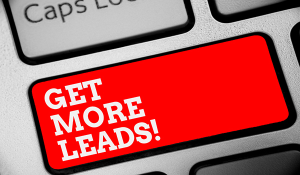 Red button on the keyboard with white lettering: ‘GET MORE LEADS!’
